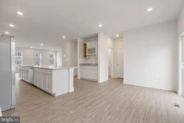 a view of kitchen with wooden floor