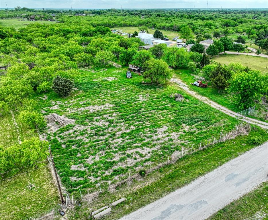 206 185th Rice, TX 75155 - Photo 12 of 23 a view of a garden with a lake view
