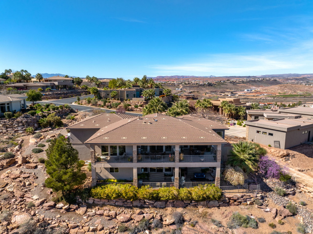 2376 Stone Crest Circle St. George, UT 84790 - Photo 57 of 61 Aerial view of residential area with a mountainous background