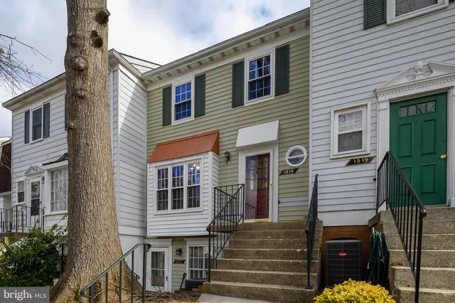 a front view of a house with parking