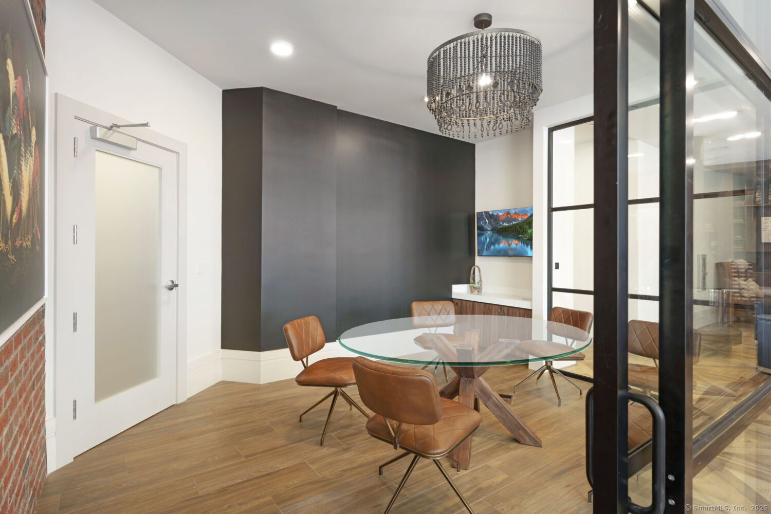 630 Chapel Street, Unit 2BMODEL New Haven, CT 06510 - Photo 13 of 40 a view of a dining room with furniture window and wooden floor