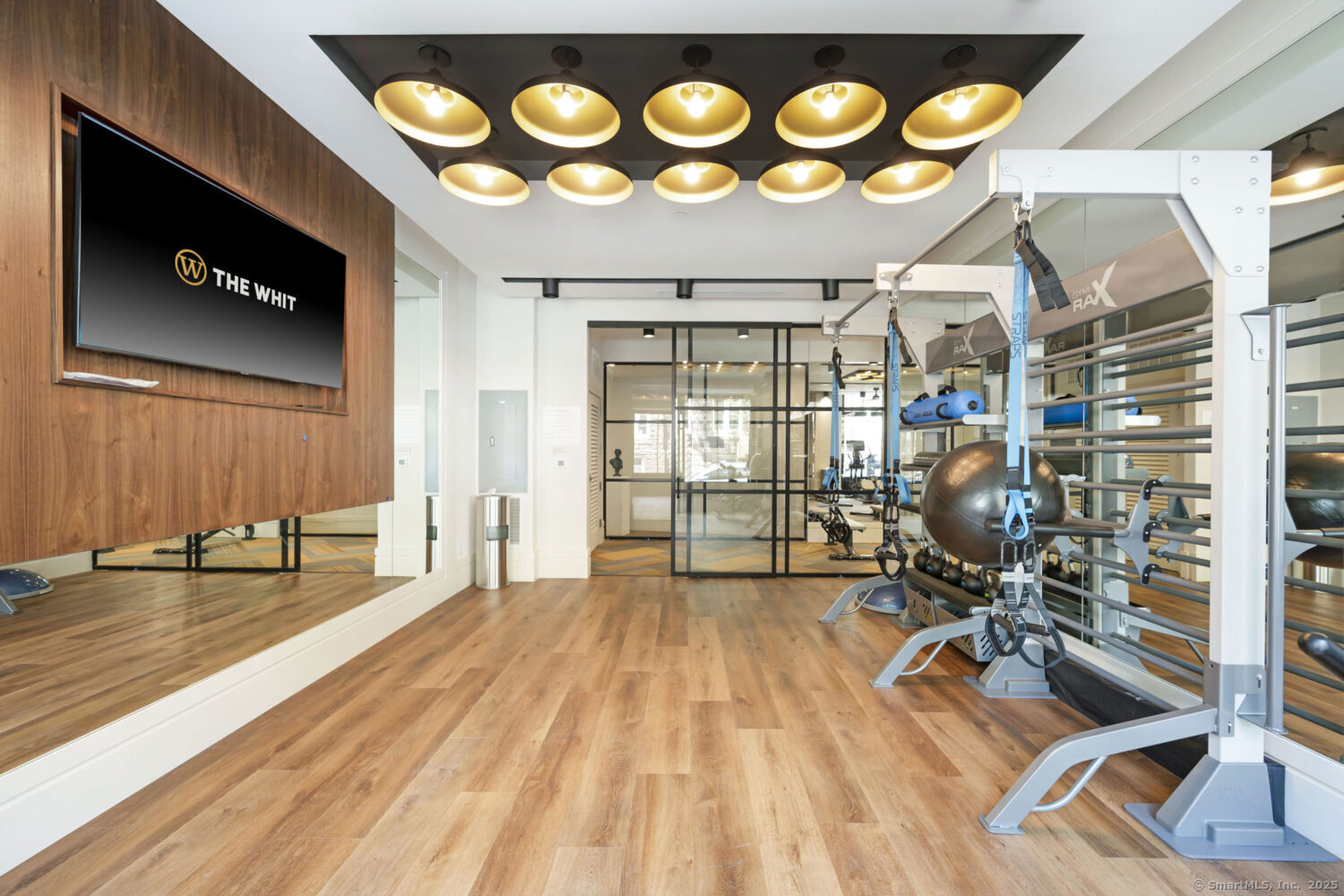 630 Chapel Street, Unit 2BMODEL New Haven, CT 06510 - Photo 15 of 40 a view of a room with gym equipment