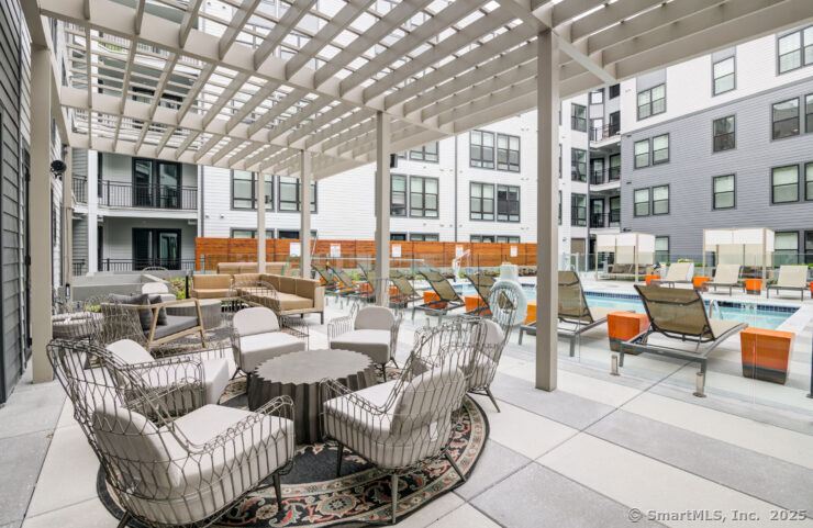 630 Chapel Street, Unit 2BMODEL New Haven, CT 06510 - Photo 2 of 40 a outdoor space with patio couches and a potted plant