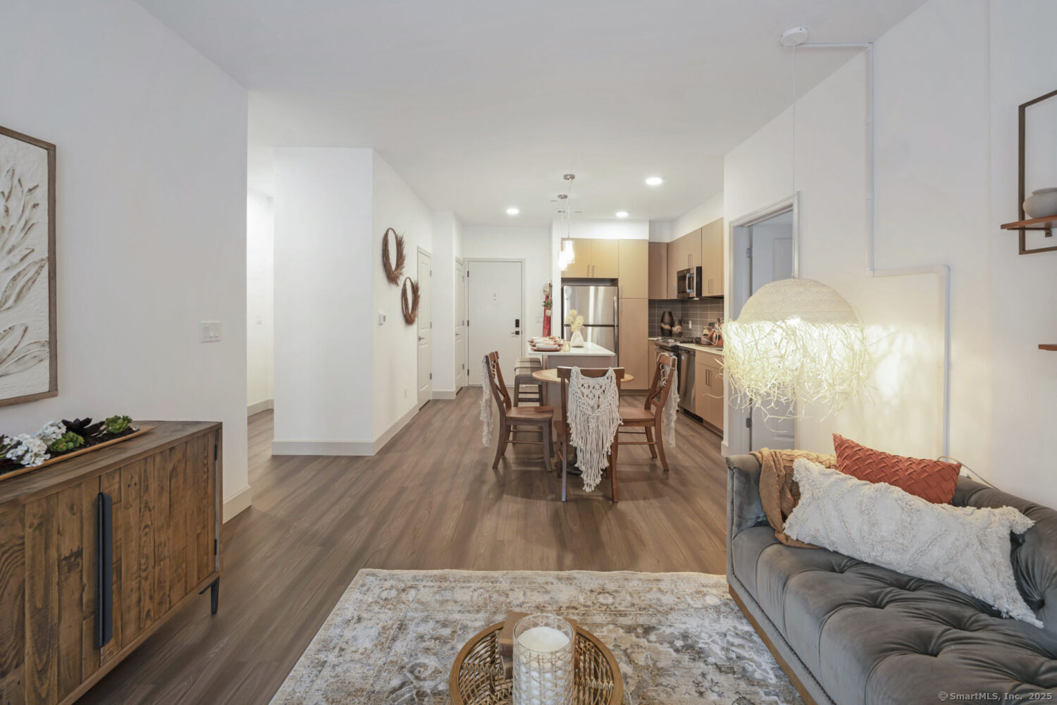630 Chapel Street, Unit 2BMODEL New Haven, CT 06510 - Photo 32 of 40 a living room with furniture and a wooden floor
