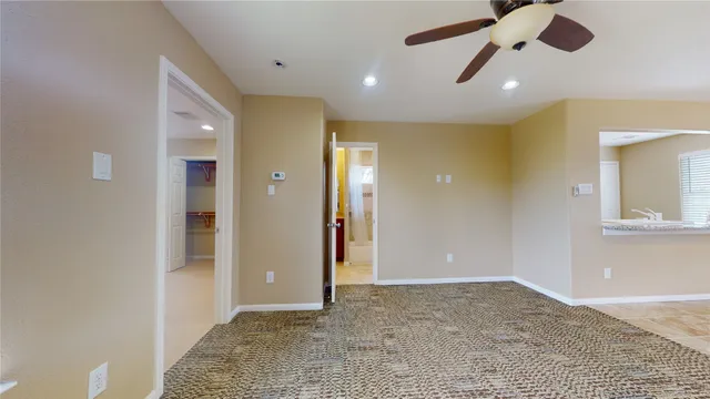 a bathroom with a bathtub and toilet