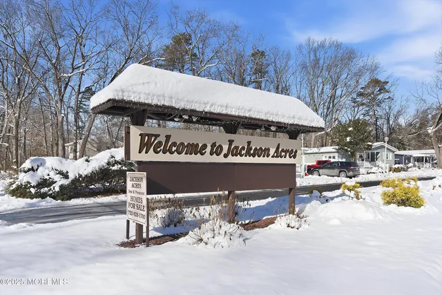 a view of a park with sitting area