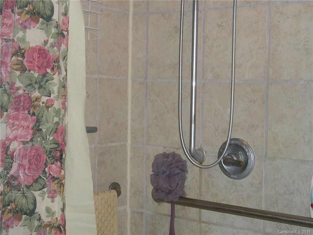 4904 Morgan Mill Road Monroe, NC 28110 - Photo 18 of 24 a bathroom with a shower