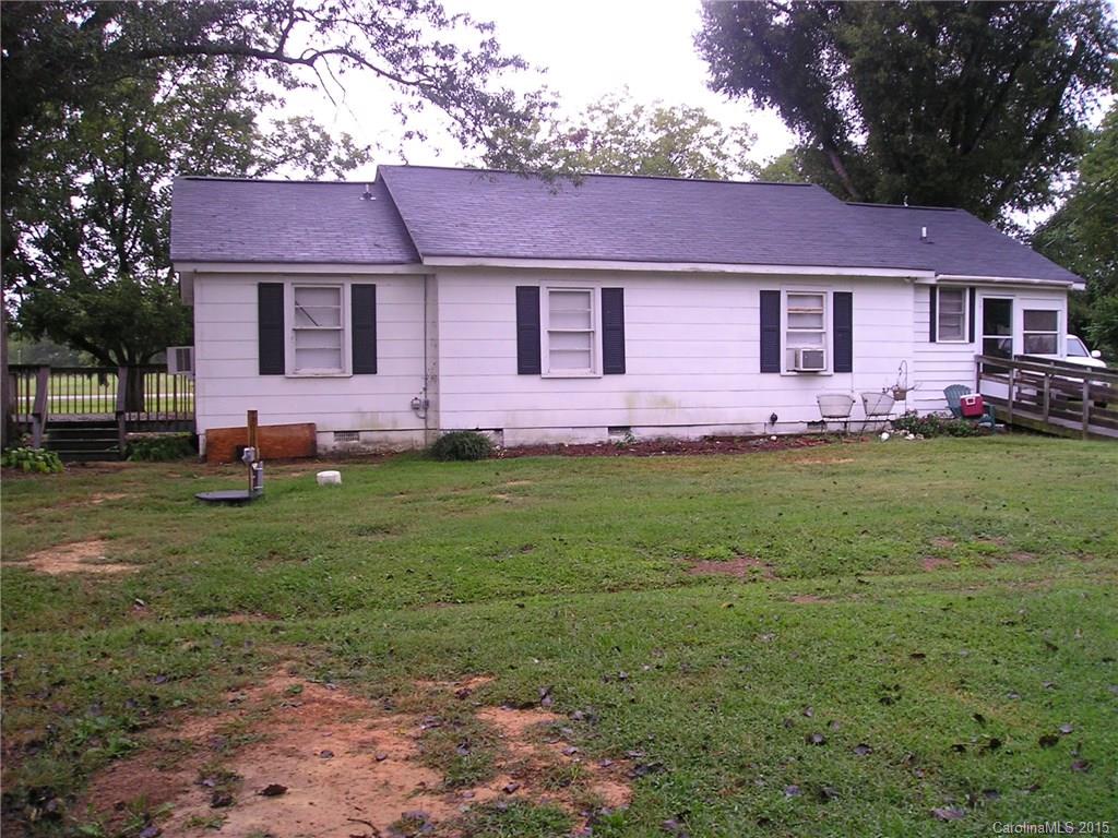 4904 Morgan Mill Road Monroe, NC 28110 - Photo 3 of 24 a front view of a house with a garden