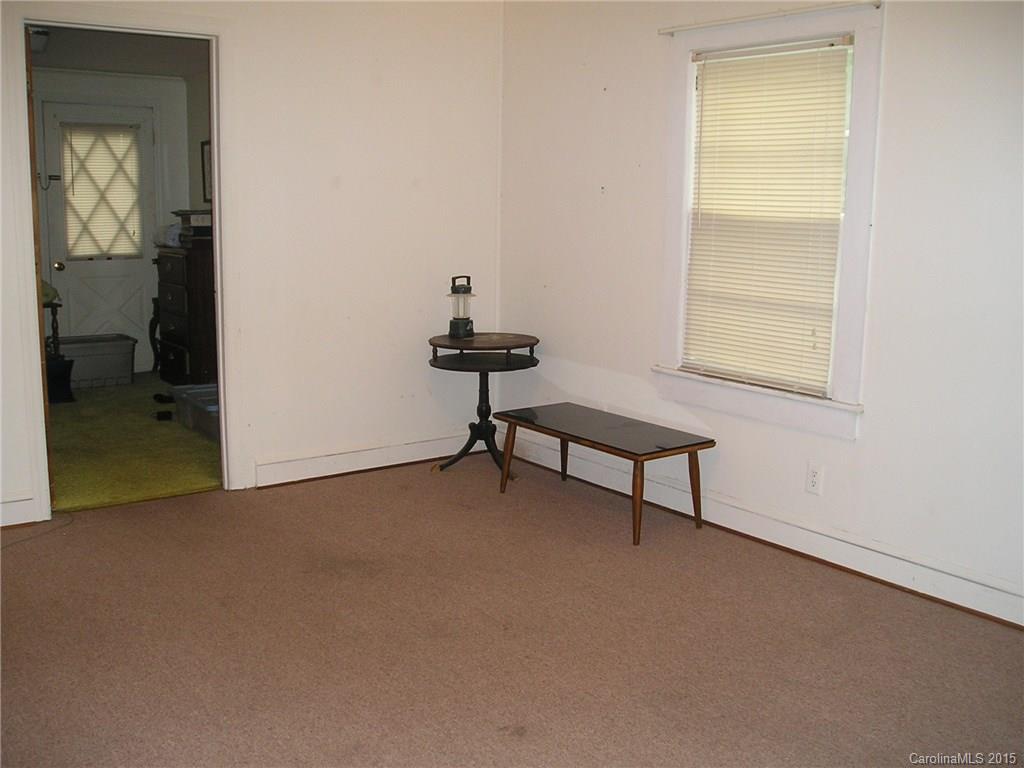 4904 Morgan Mill Road Monroe, NC 28110 - Photo 10 of 24 a view of an empty room with a window
