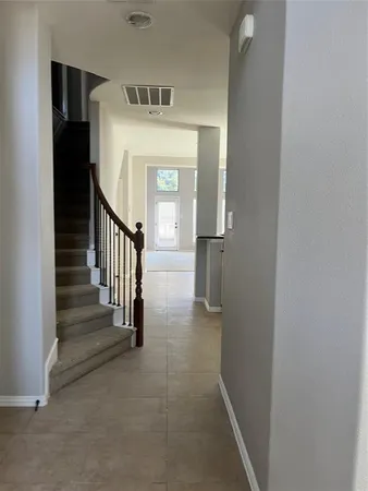 a view of a hallway with entryway