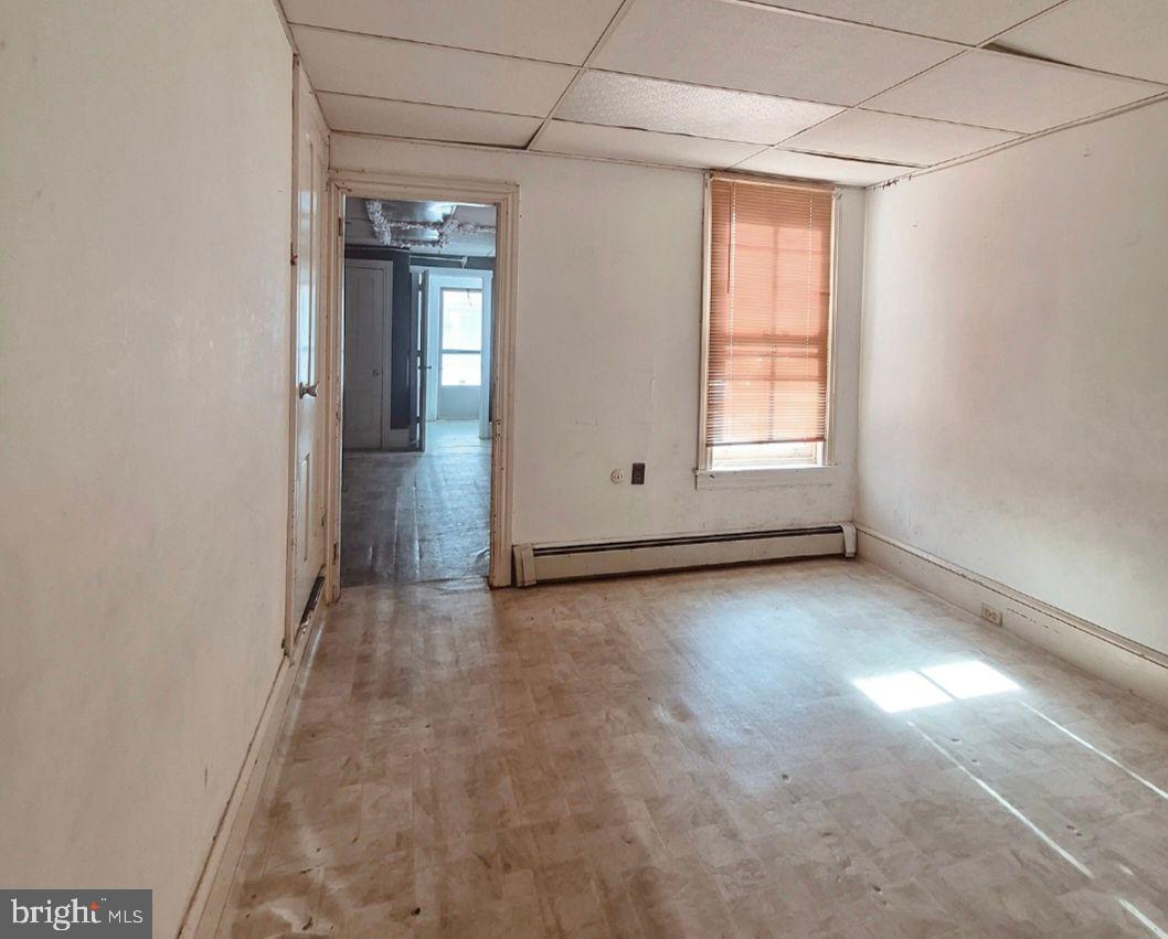 1262 Buttonwood Street Reading, PA 19604 - Photo 16 of 22 an empty room with windows