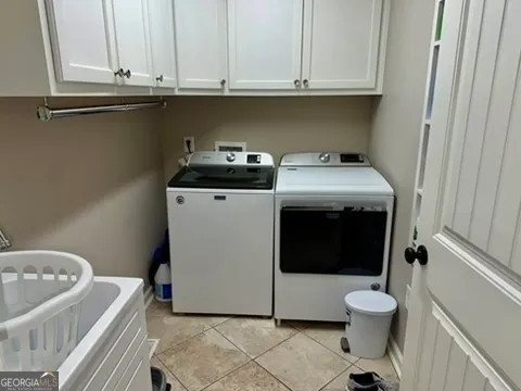 a view of a house with a street