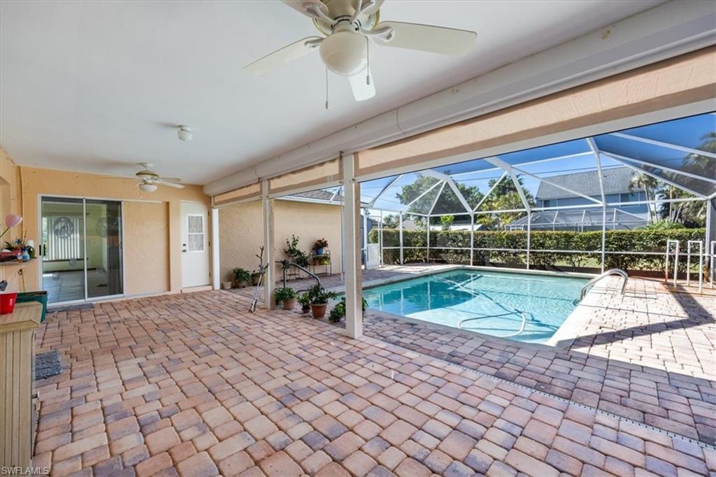 17520 Homewood Road Fort Myers, FL 33967 - Photo 3 of 24 a view of a porch with furniture and floor to ceiling window