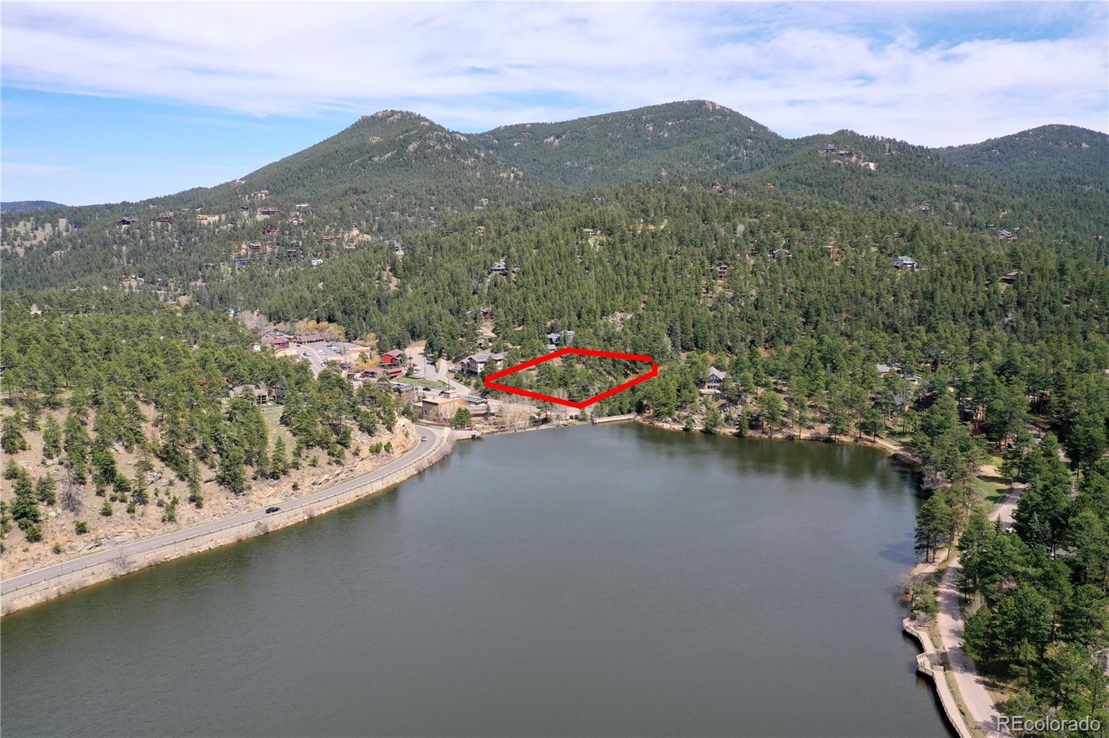 4690 Highway 73 Evergreen Co 80439 Evergreen, CO 80439 - Photo 14 of 34 a view of a lake with a mountain
