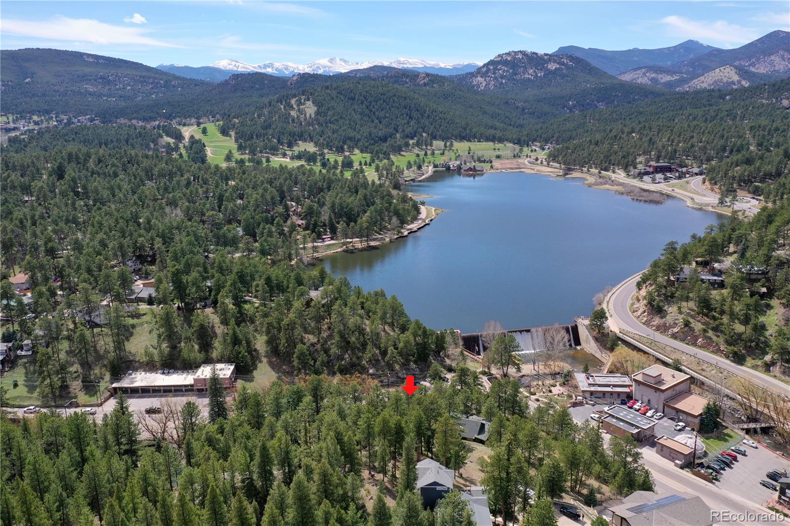 4690 Highway 73 Evergreen Co 80439 Evergreen, CO 80439 - Photo 3 of 34 an aerial view of a house with a garden