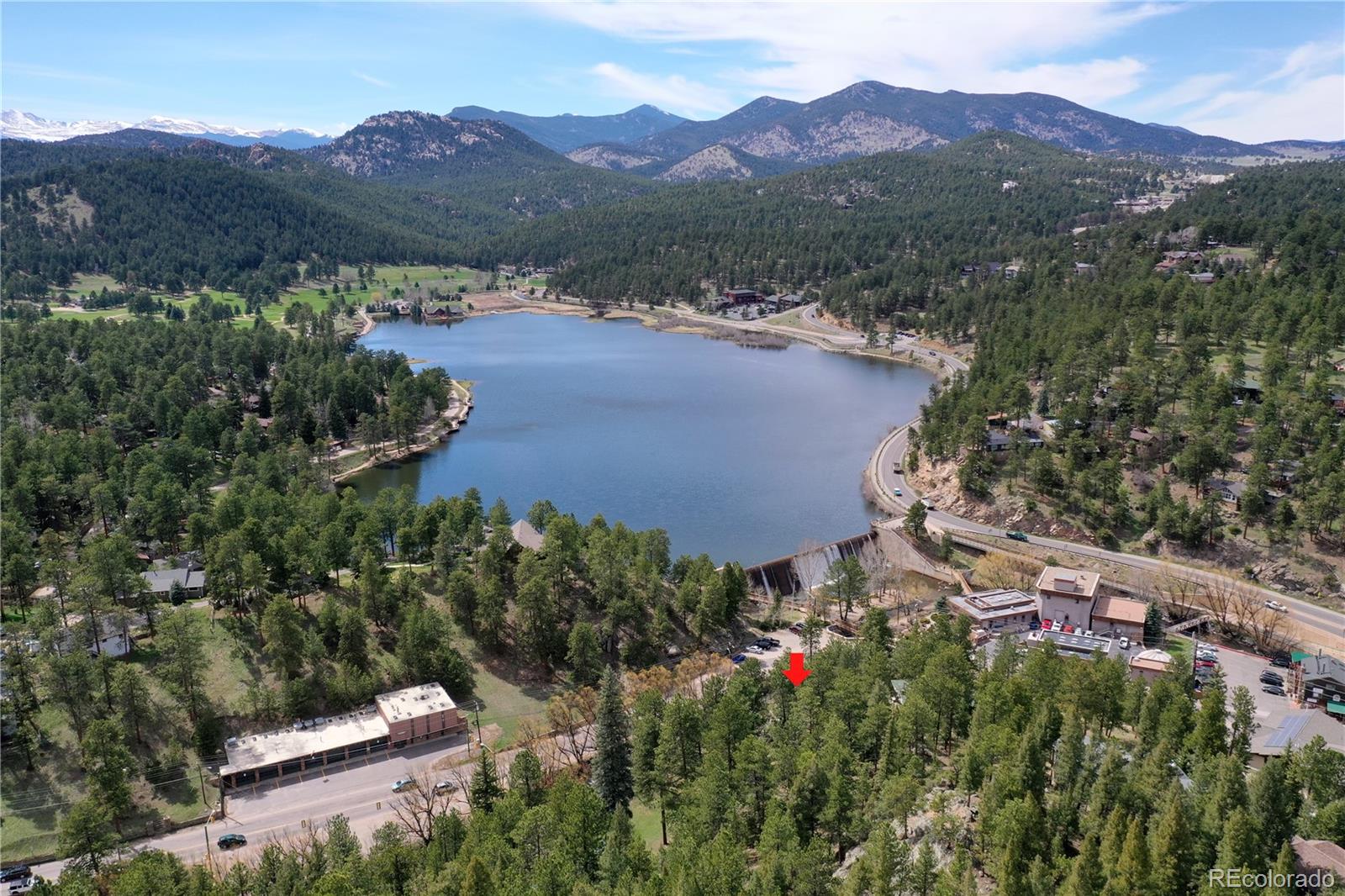 4690 Highway 73 Evergreen Co 80439 Evergreen, CO 80439 - Photo 4 of 34 an aerial view of a house with a garden
