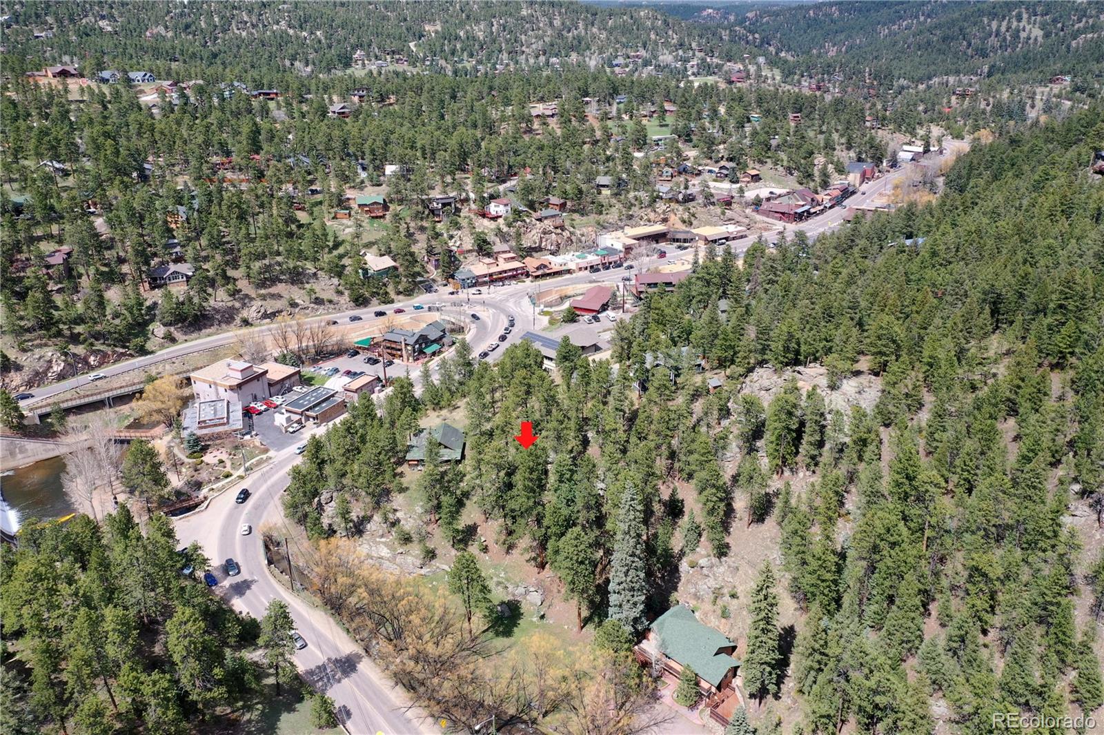 4690 Highway 73 Evergreen Co 80439 Evergreen, CO 80439 - Photo 6 of 34 an aerial view of residential houses with outdoor space
