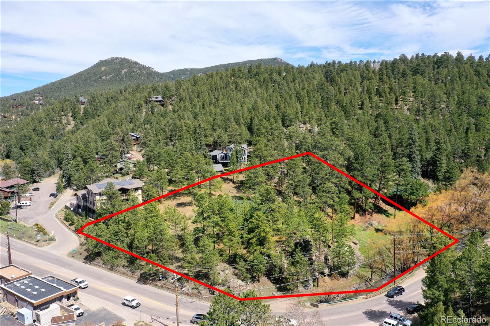 4690 Highway 73 Evergreen Co 80439 Evergreen, CO 80439 - Photo 10 of 34 an aerial view of a house