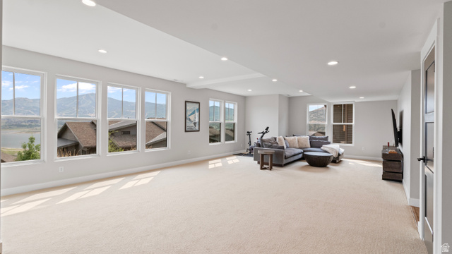 355 East Overlook Loop Hideout, UT 84036 - Photo 27 of 40 Spacious room with light-toned carpeting and recessed lighting