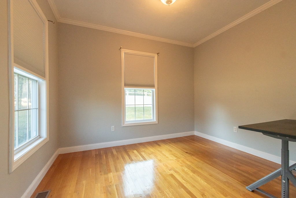 7 Buffy Road Bellingham, MA 02019 - Photo 14 of 34 wooden floor in an empty room with a window