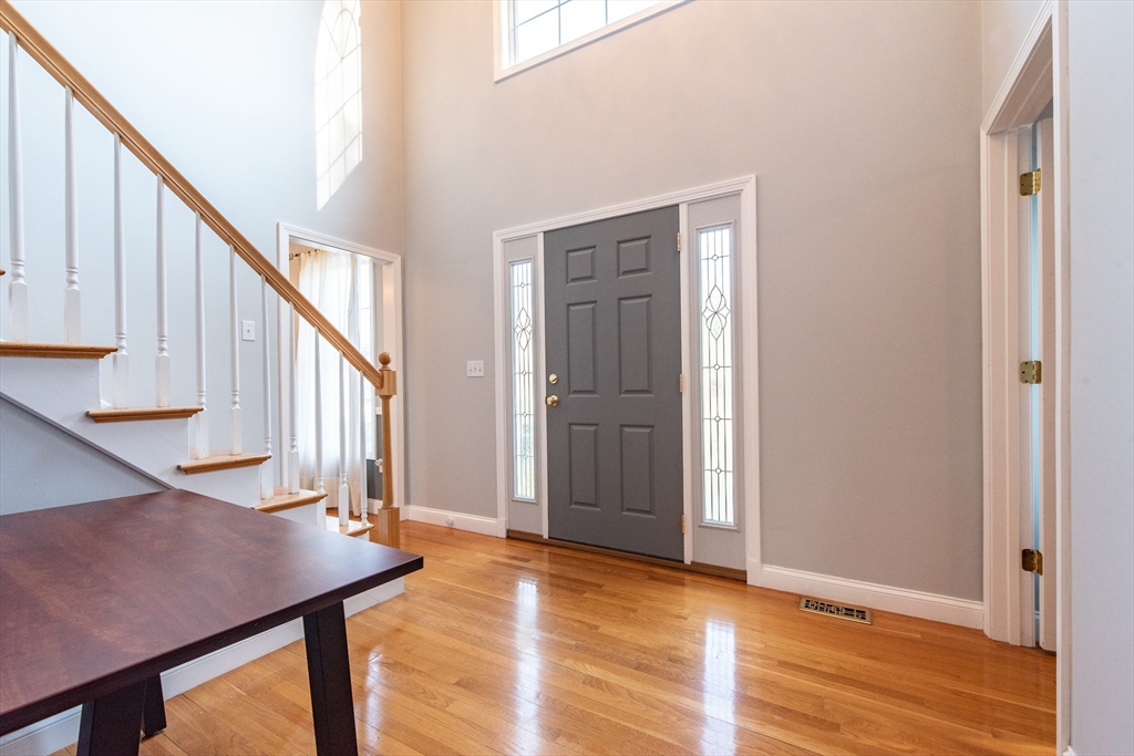 7 Buffy Road Bellingham, MA 02019 - Photo 3 of 34 a view of entryway and hall with wooden floor