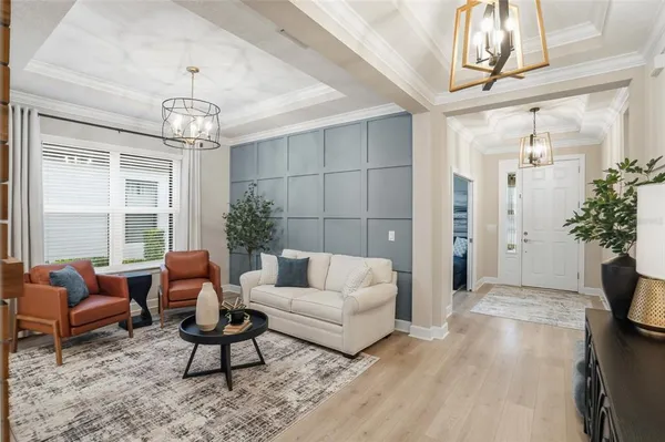 a large kitchen with kitchen island a stove a sink a center island a table and chairs