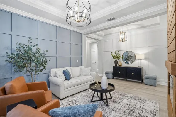 a kitchen with stainless steel appliances granite countertop a stove and a white cabinets
