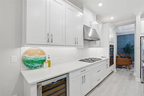 a bedroom with a bed dresser and a window