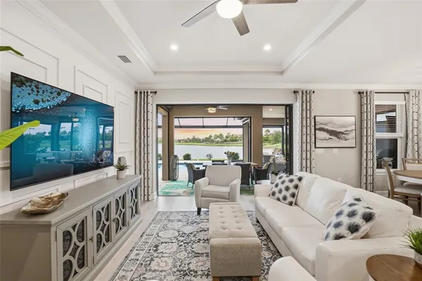 a view of a dining room with furniture window and outside view