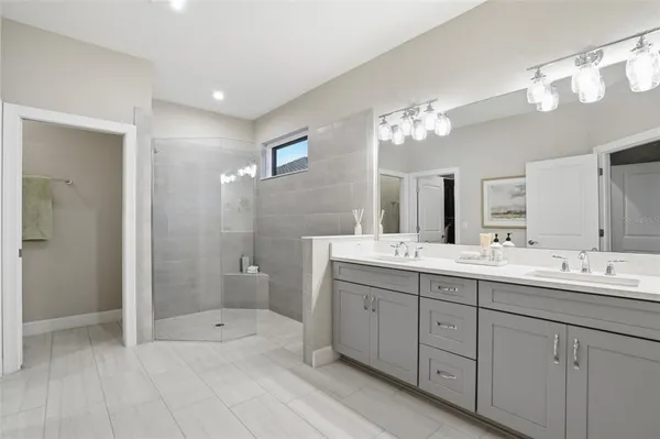 a view of a patio with swimming pool table and chairs