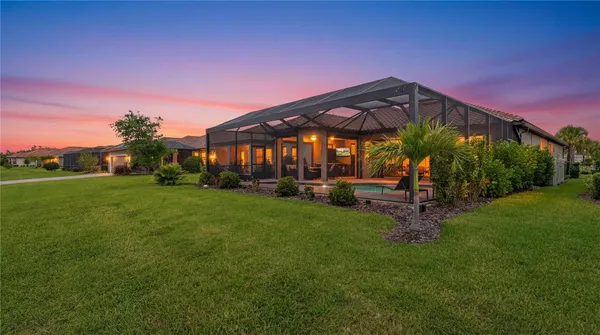 a spacious bedroom with a bed and a window