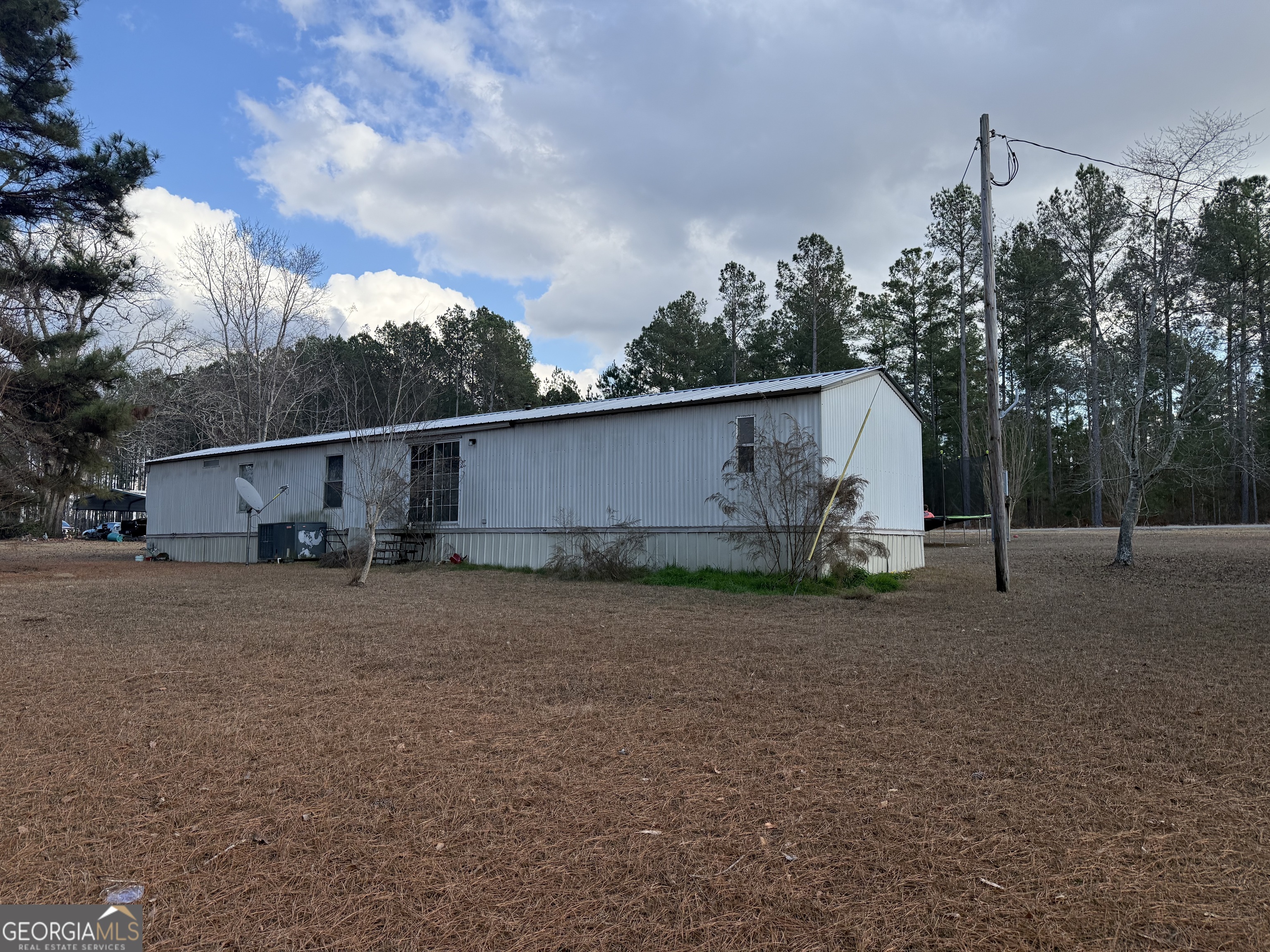 1775-1779 Payne Road Rentz, GA 31075 - Photo 35 of 51 a view of a house with backyard and trees