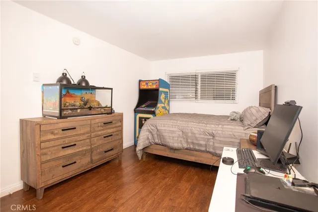 a bedroom with a bed and furniture