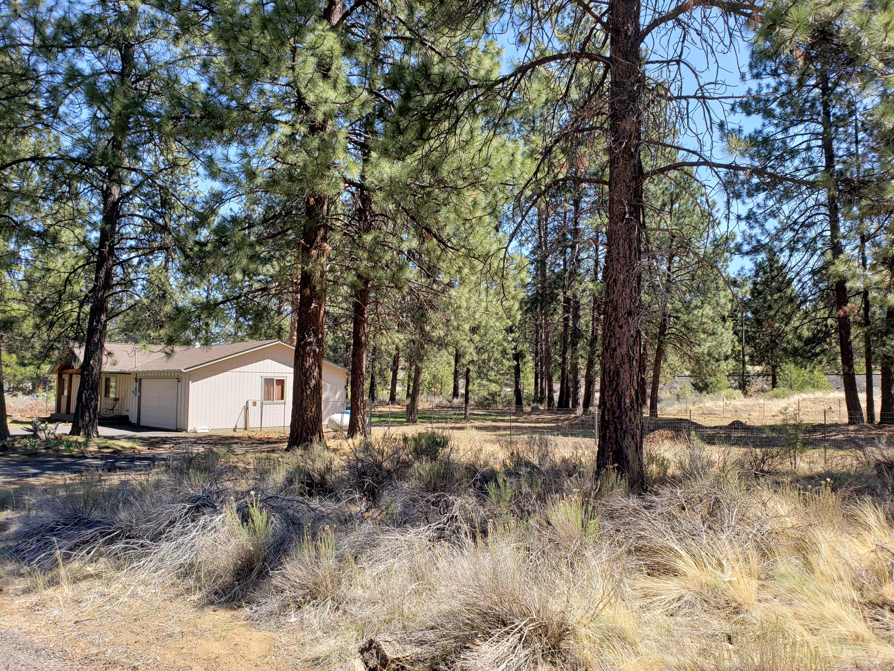 59948 Cheyenne Road Bend, OR 97702 - Photo 2 of 12 Side Yard