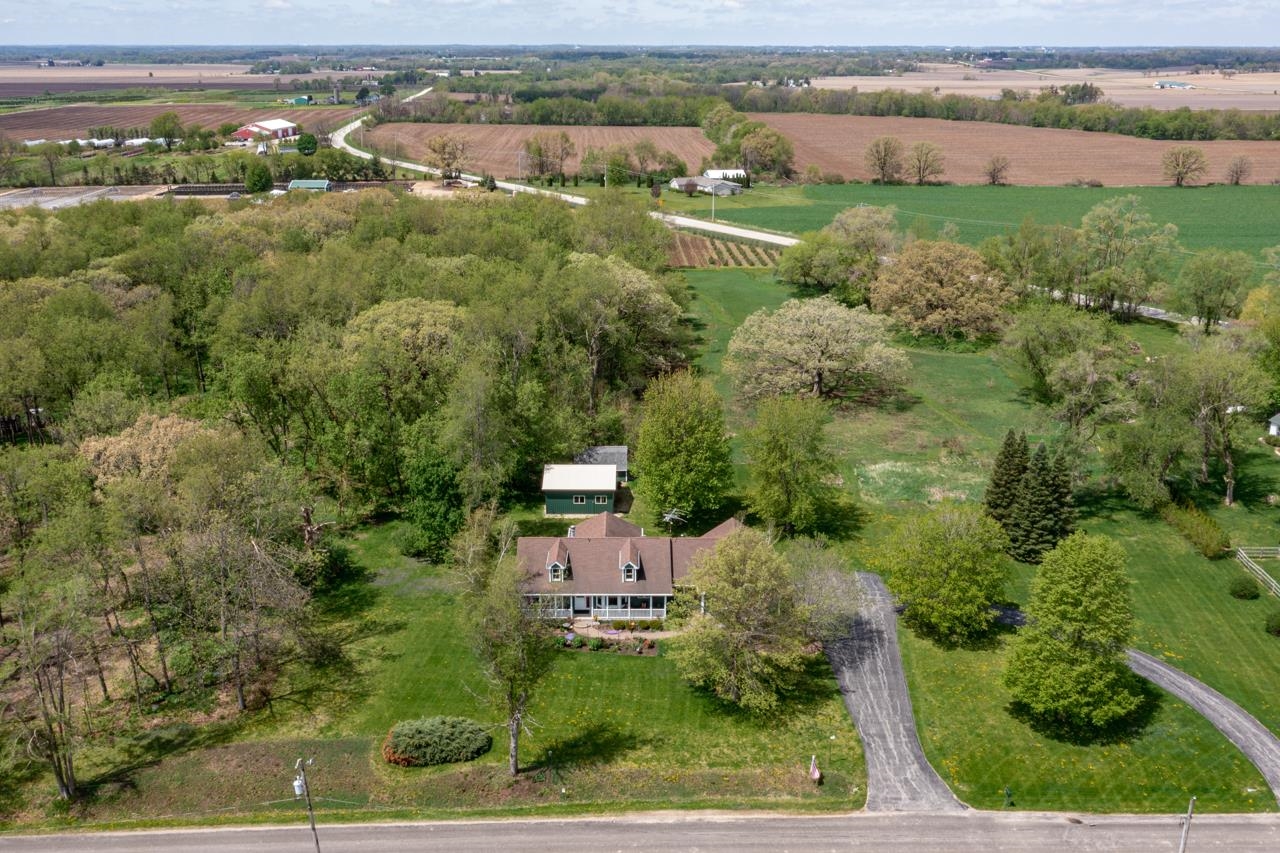 3013 Pagles Road Harvard, IL 60033 - Photo 5 of 35 an aerial view of a house with a yard and lake view