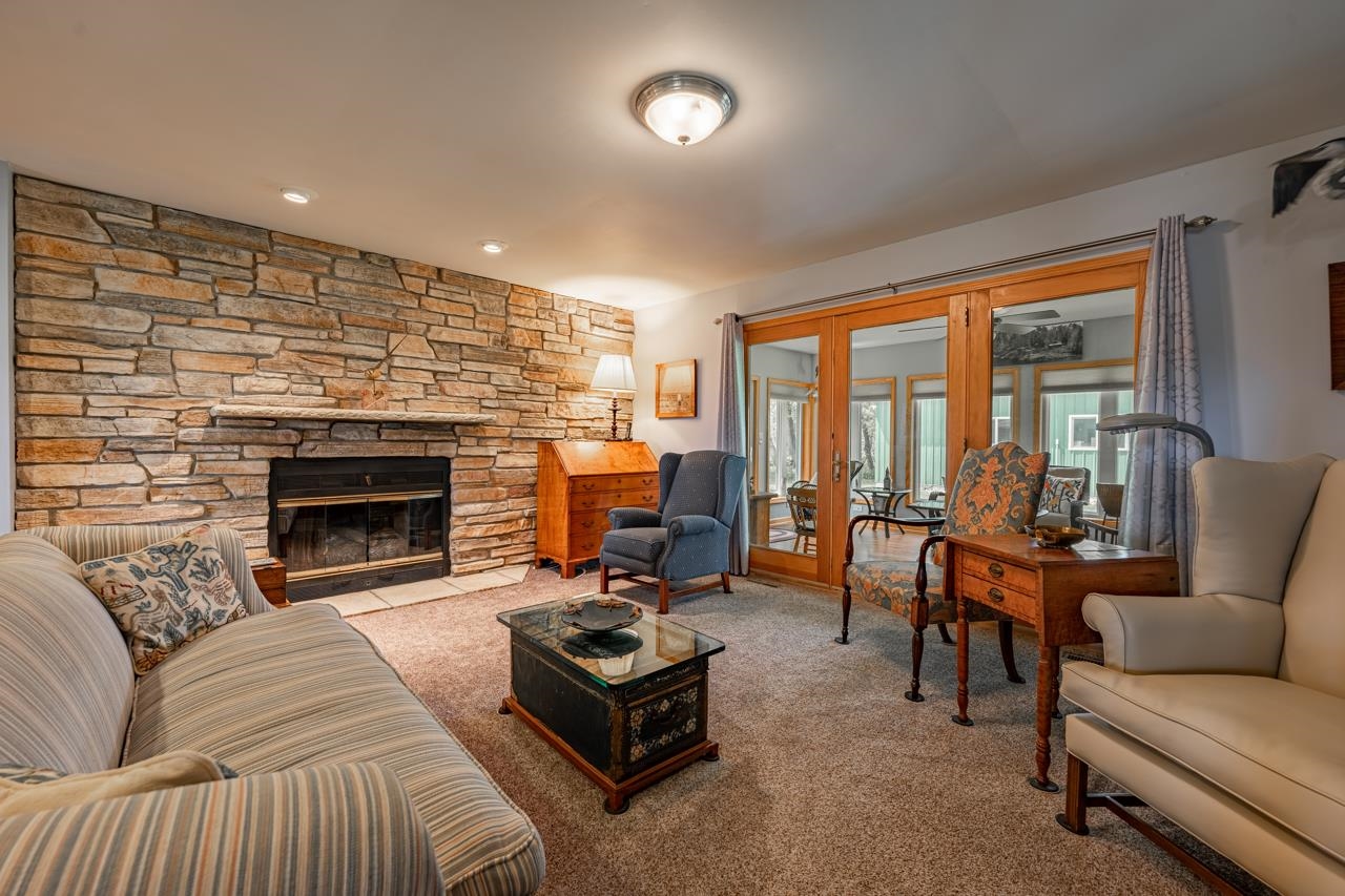 3013 Pagles Road Harvard, IL 60033 - Photo 10 of 35 a living room with furniture fireplace and a large window