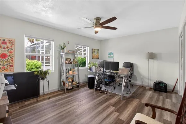 a bedroom with furniture and a window