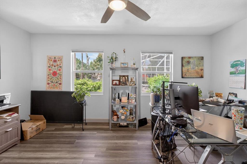 5539 Delaware Avenue New Port Richey, FL 34652 - Photo 33 of 95 a view of a workspace with furniture and a window