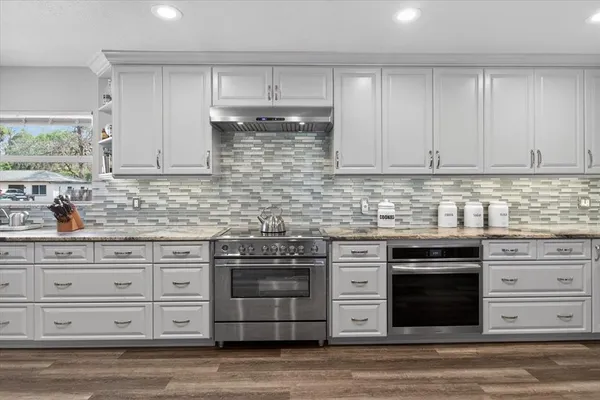 an aerial view of residential building with green space