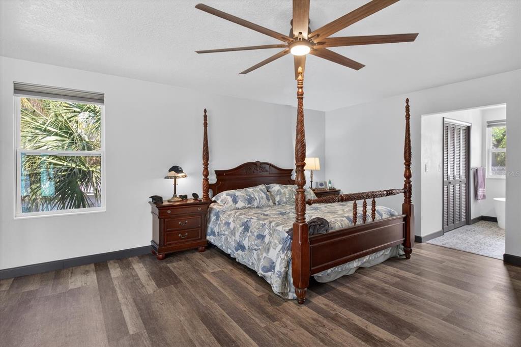 5539 Delaware Avenue New Port Richey, FL 34652 - Photo 53 of 95 a bed sitting in a bedroom next to a window