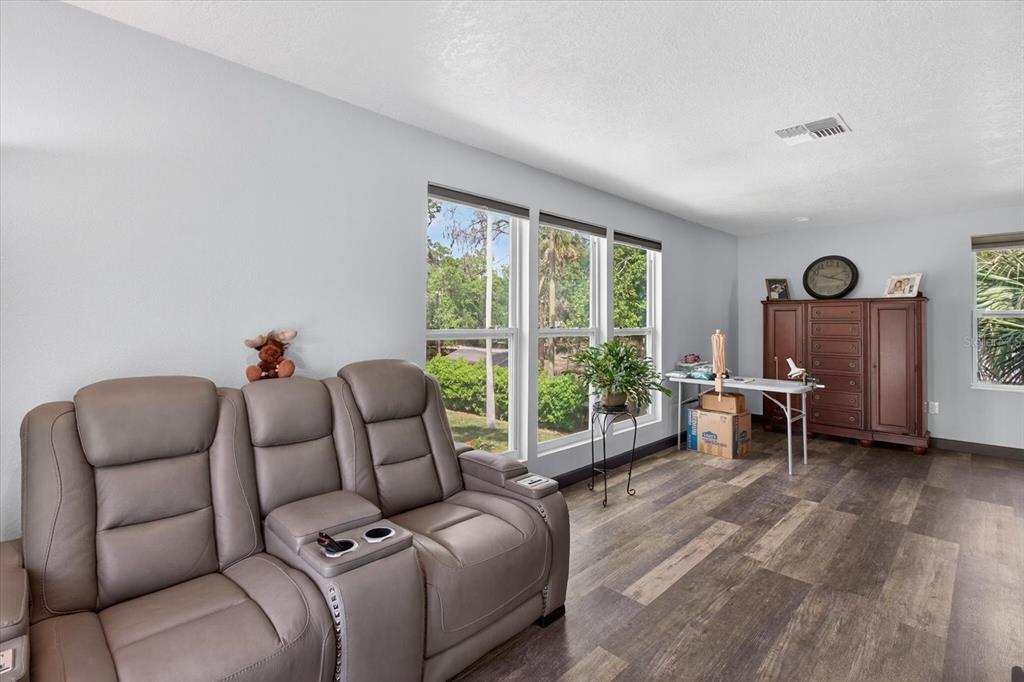 5539 Delaware Avenue New Port Richey, FL 34652 - Photo 62 of 95 a work room with furniture and a large window