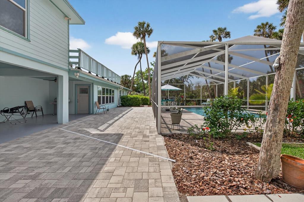 5539 Delaware Avenue New Port Richey, FL 34652 - Photo 73 of 95 a view of a house with backyard and sitting area