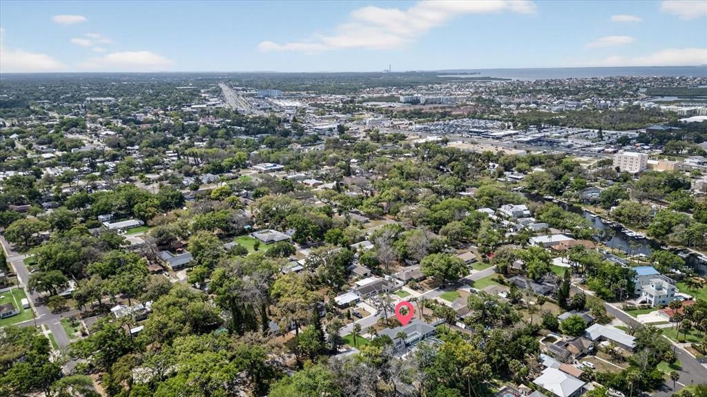 5539 Delaware Avenue New Port Richey, FL 34652 - Photo 8 of 95 an aerial view of house with yard and mountain view in back