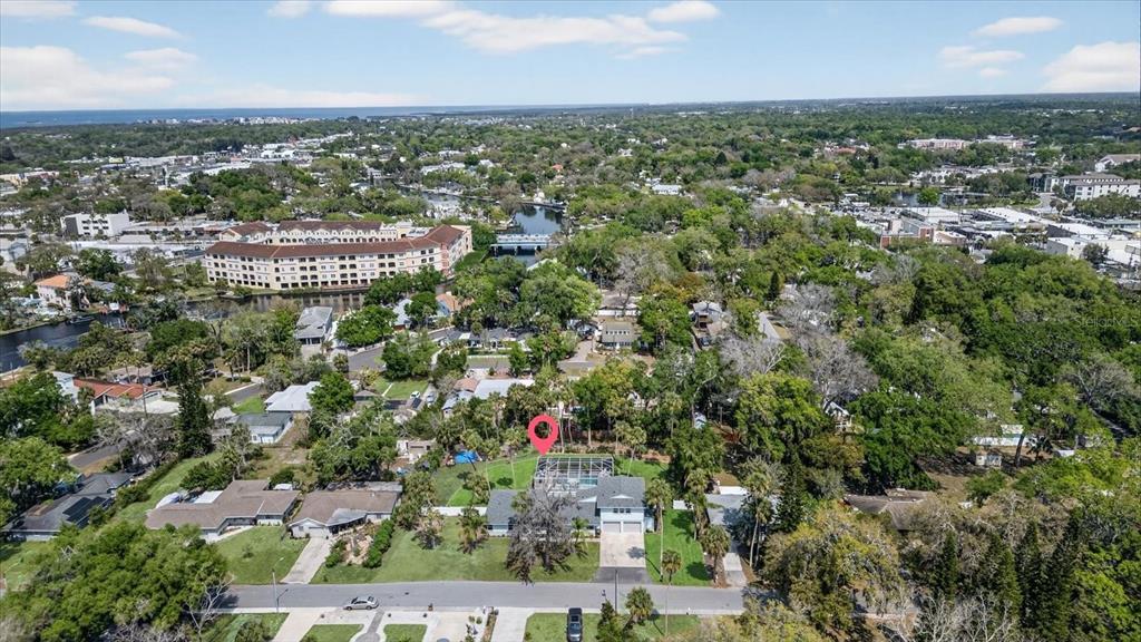 5539 Delaware Avenue New Port Richey, FL 34652 - Photo 92 of 95 an aerial view of residential building with green space