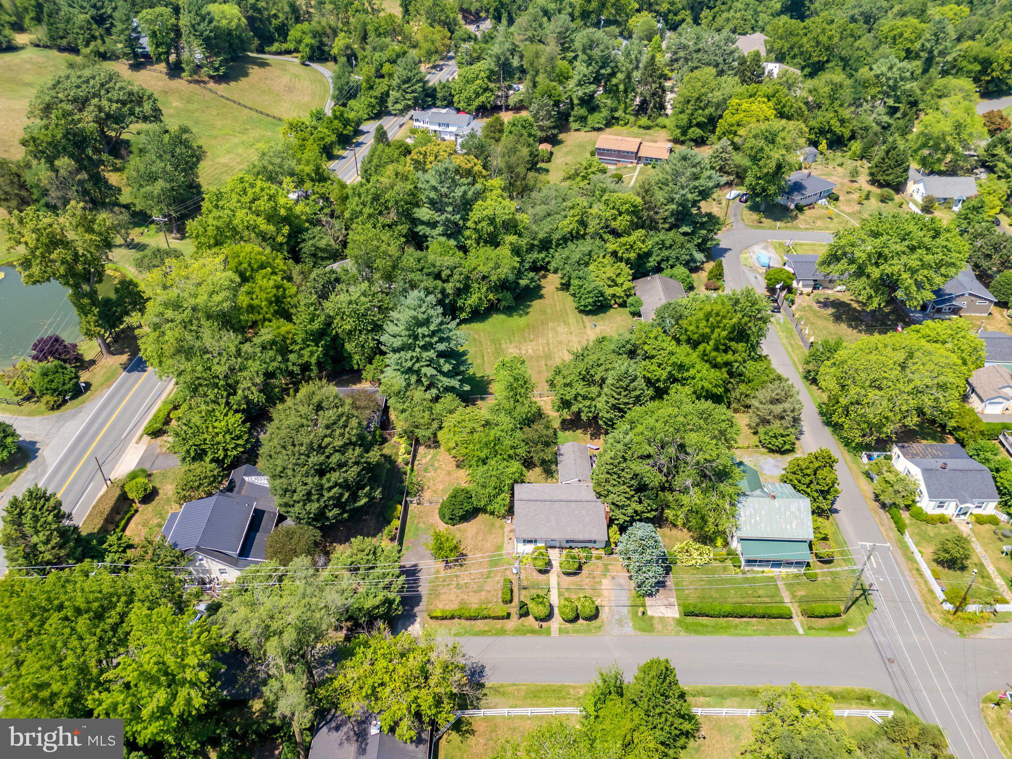 4 Chestnut Street Middleburg, VA 20117 - Photo 12 of 15 an aerial view of residential houses with outdoor space and trees
