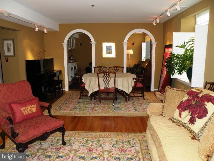 820 William Street, Unit 102 Baltimore, MD 21230 - Photo 13 of 14 a view of living room filled with furniture and a large window