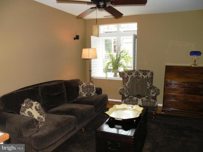 820 William Street, Unit 102 Baltimore, MD 21230 - Photo 3 of 14 a living room with furniture flowerpot and a window