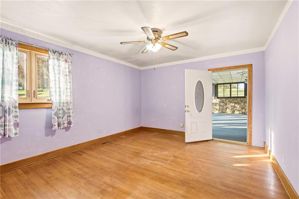 372 Lincoln Street Somerset, PA 15501 - Photo 27 of 50 wooden floor in an empty room with a window