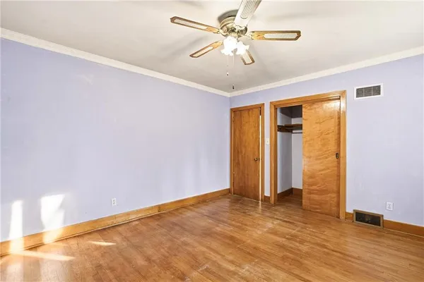 a spacious bathroom with a large tub and shower