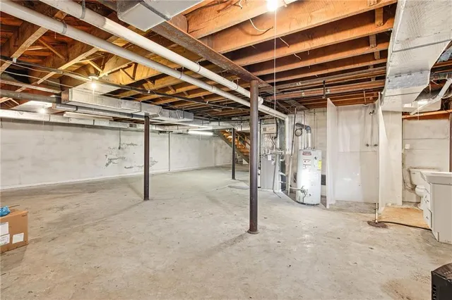 a view of an empty room with storage